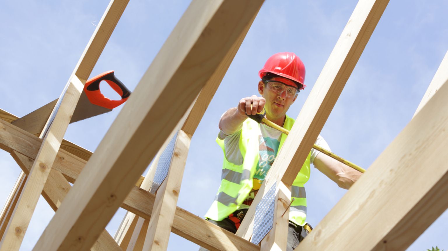 A workman on a roof