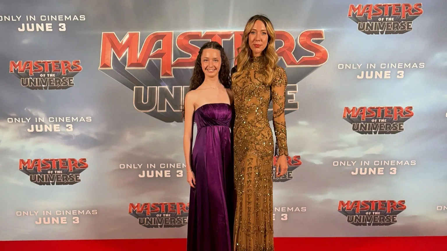 Supplied Delilah O'Riordan with Christiaan Bettridge posing for a picture on the red carpet event for Masters of the Universe