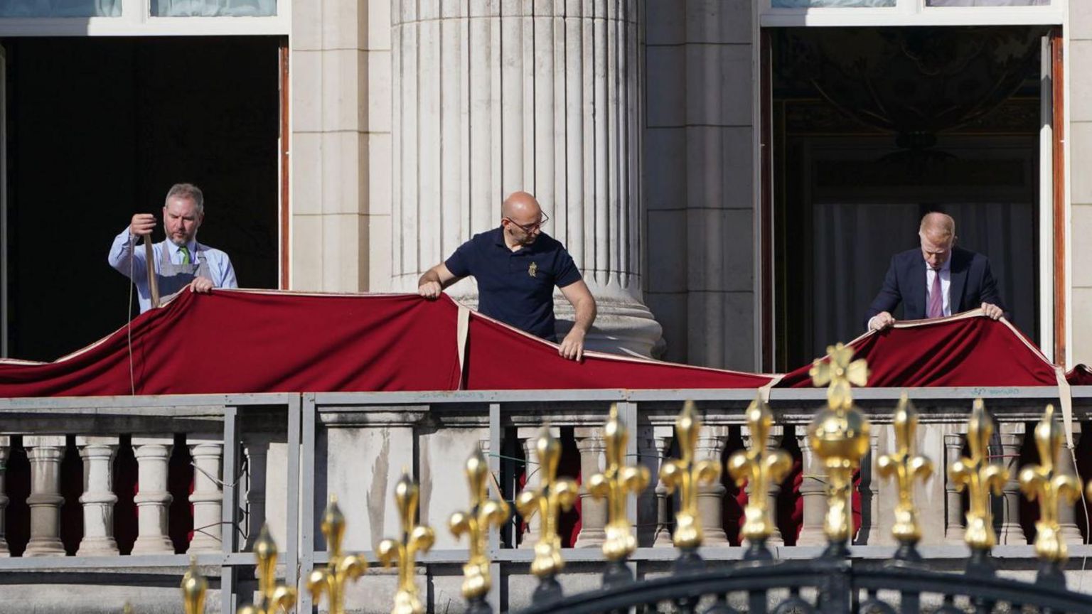 Royal servants getting the balcony ready