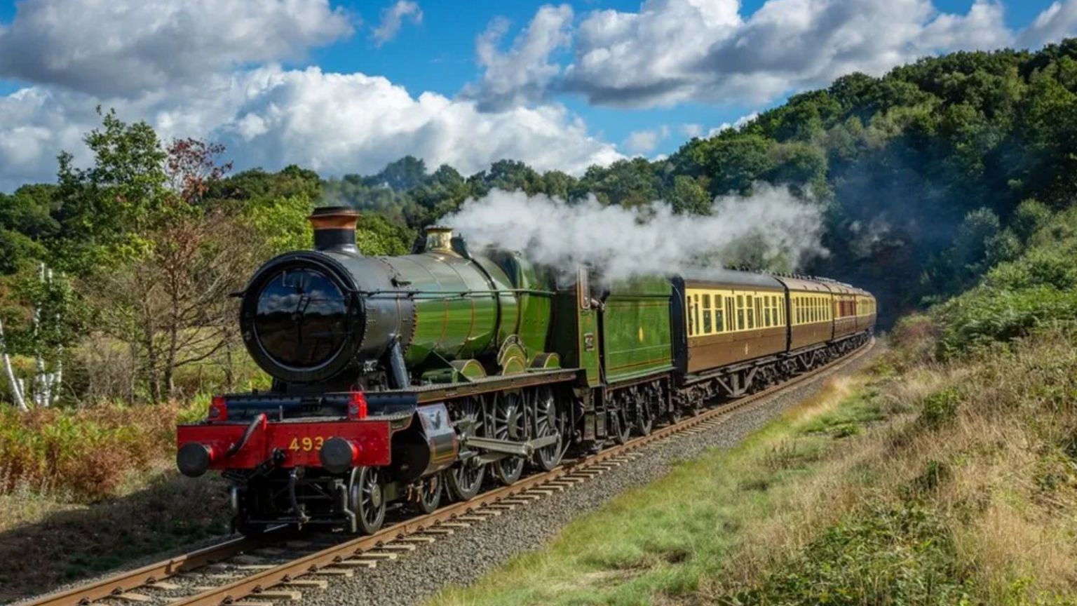 A green steam train