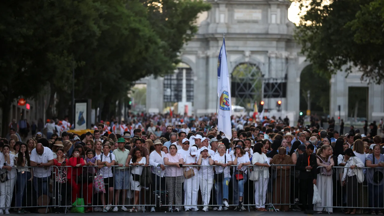 Reuters Faithful wait ahead of a Holy Mass celebrated by Pope Leo XIV at Plaza de Cibeles