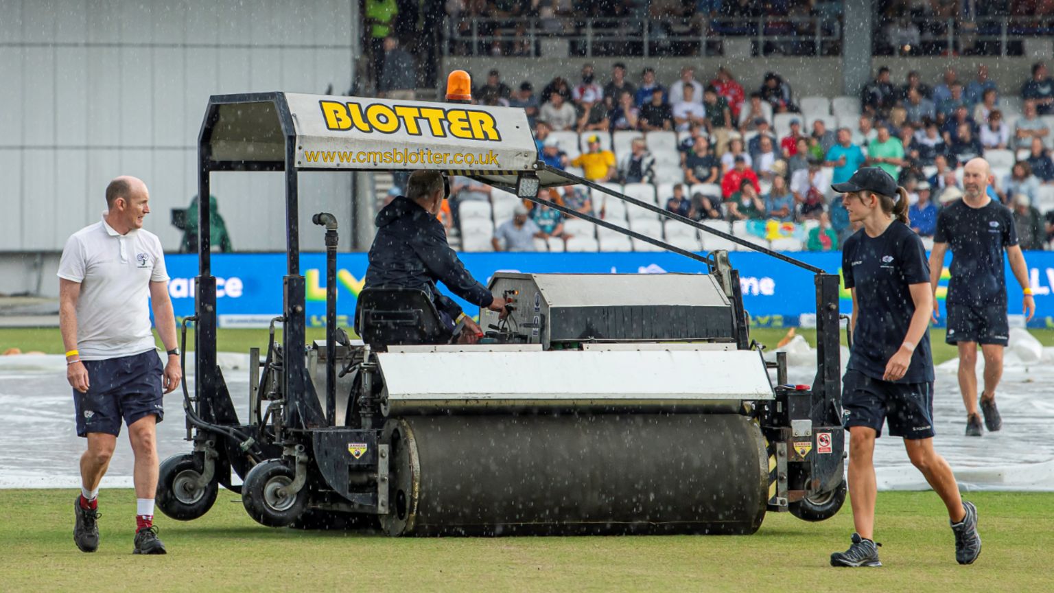 Groundstaff at Headingley pressing the field