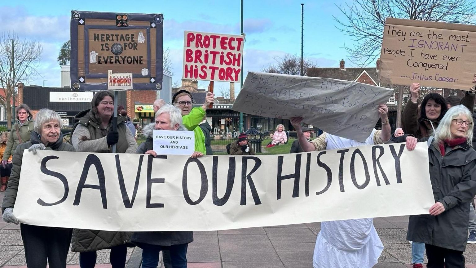 Save our History banners being held up at a protest against the development in Marske