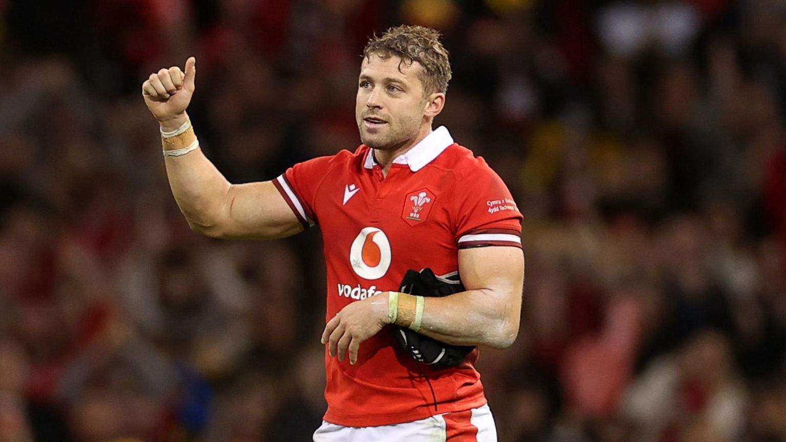 Leigh Halfpenny gives a thumbs-up after winning his 100th Wales cap