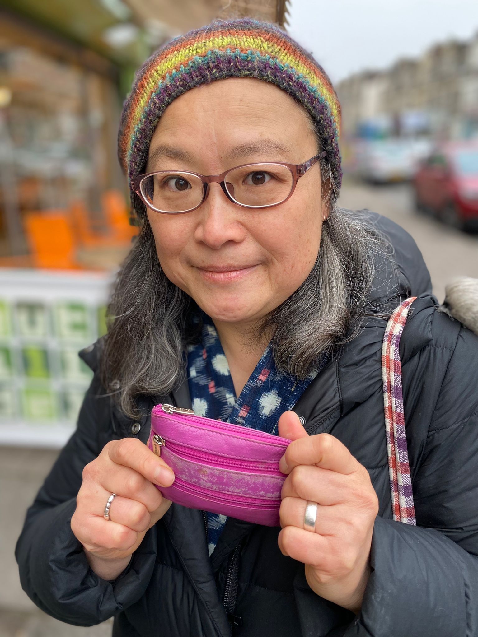 Yokiko Hosomi holding her purse