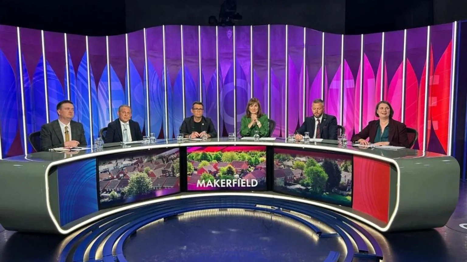 Kitty Dry Six people are sat at the Question Time desk.