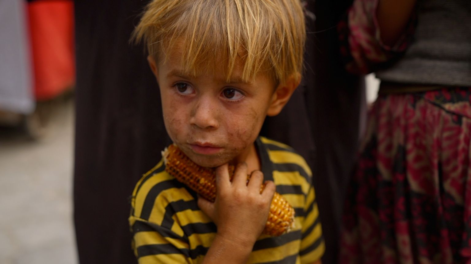 Kabul child with corn