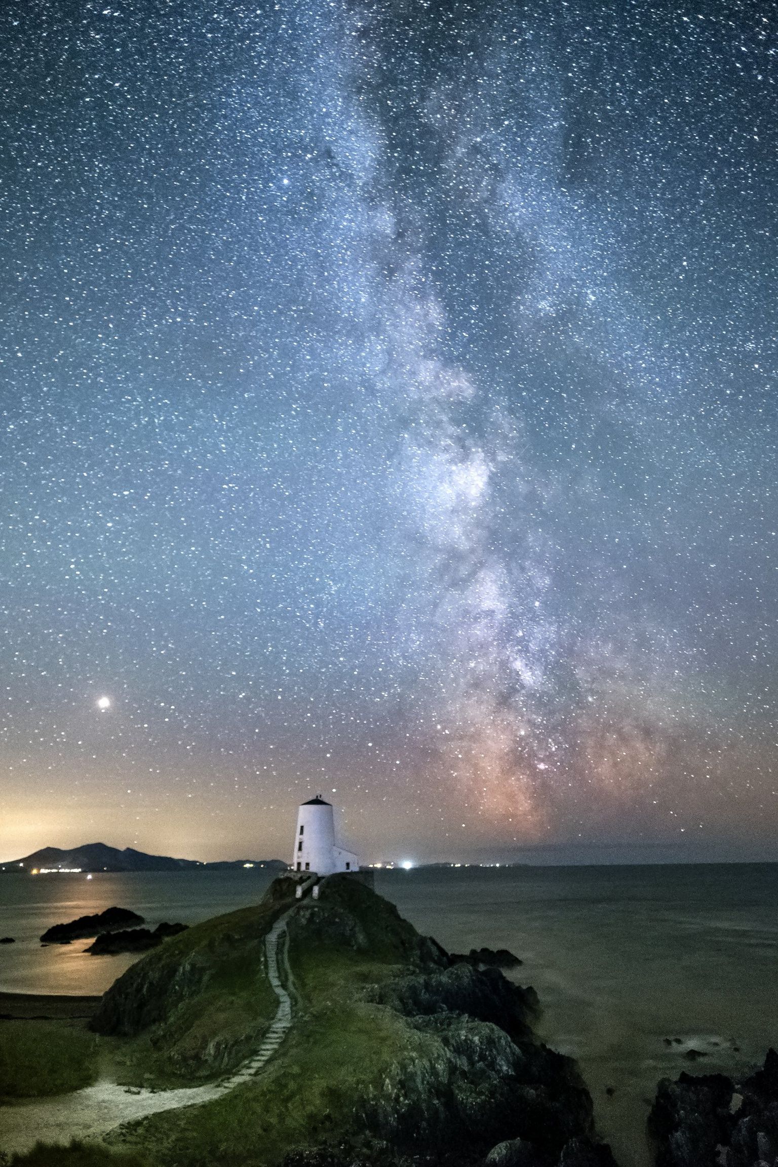 The Milkyway and night sky over Twr Mawr Lighthouse, Llanddwyn Island, Anglesey