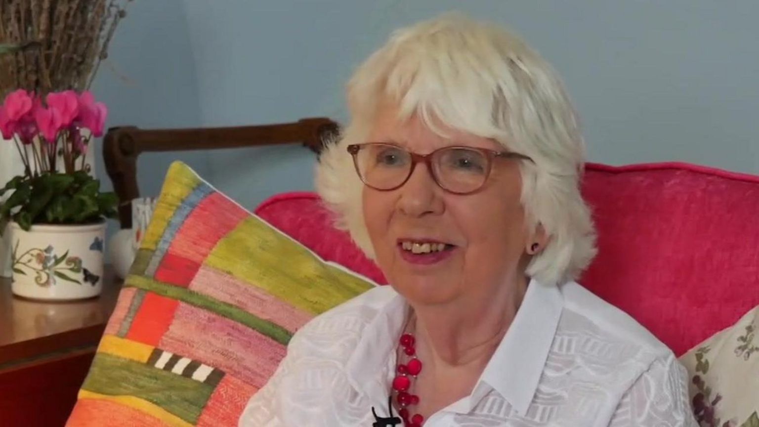 Plymouth Hoe resident Sue Dunn sat on a pink armchair with two cushions behind her