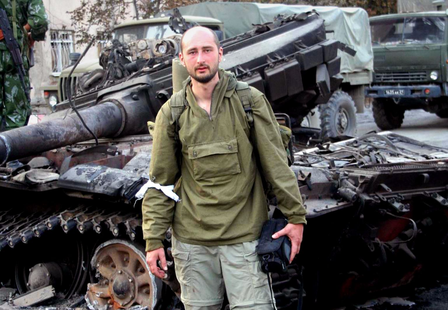 Arkady Babchenko posing in front of Georgian Army tank wreckage in Tskhinvali, South Ossetia - 2008