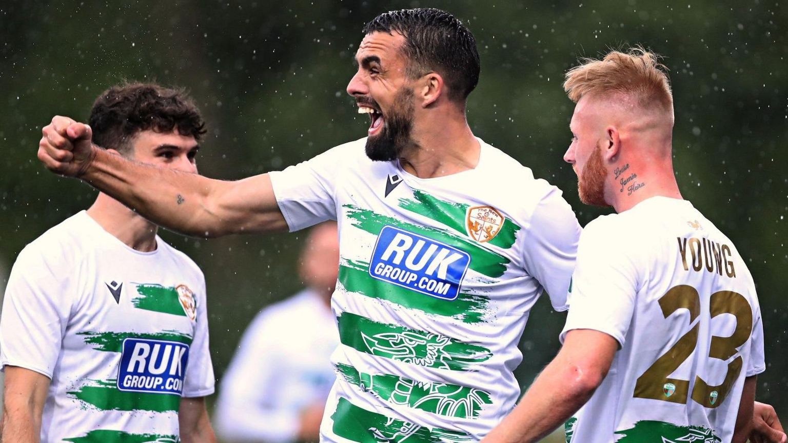 Saints players celebrate Brad Young's second goal