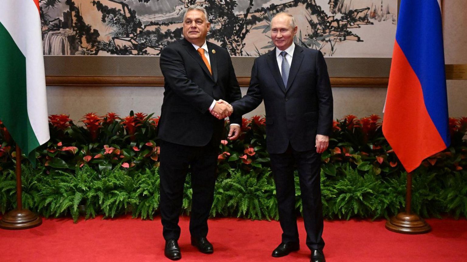 Viktor Orban (left) and Vladimir Putin shake hands at a summit in Beijing, China. Photo: 17 October 2023