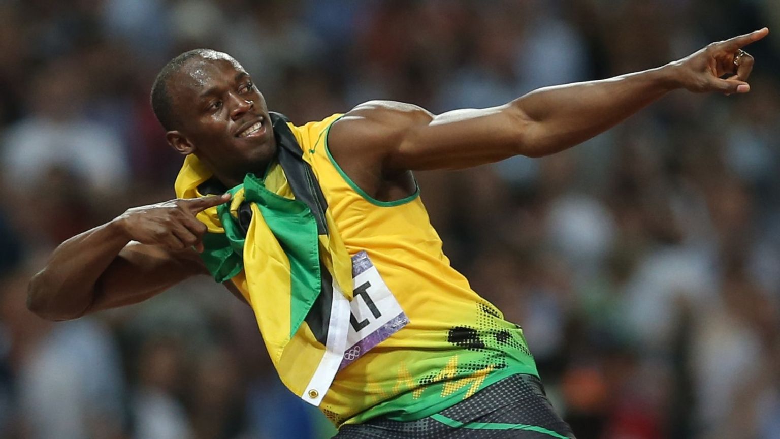 Usain Bolt celebrates after he wins gold during the Men's 200m final at the London 20212 Olympic Games.