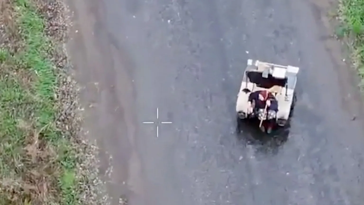 Robot seen carrying elderly woman in Ukraine