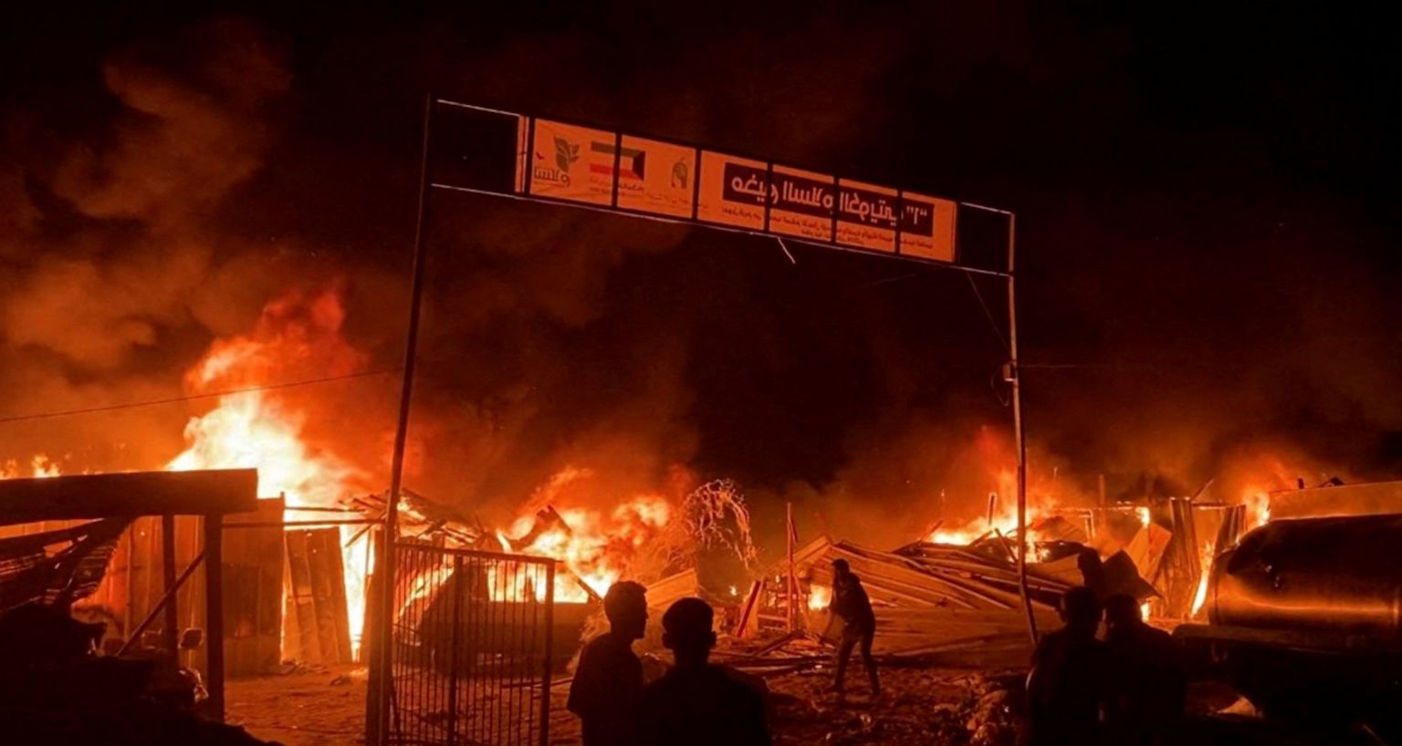 Fire rages at an area designated for displaced Palestinians in Gaza, 26 May 