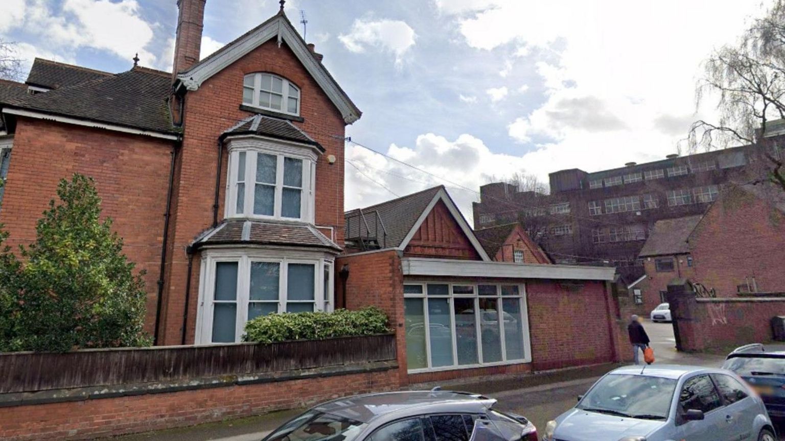 The former Marston's offices, with the city's 149-year-old Park Brewery in the background