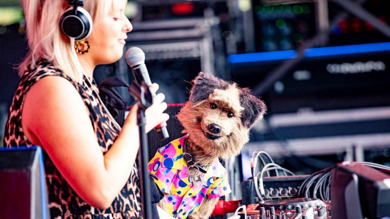 Hacker T Dog a child muppet wearing a bright yellow and pink shirt took to the DJ set