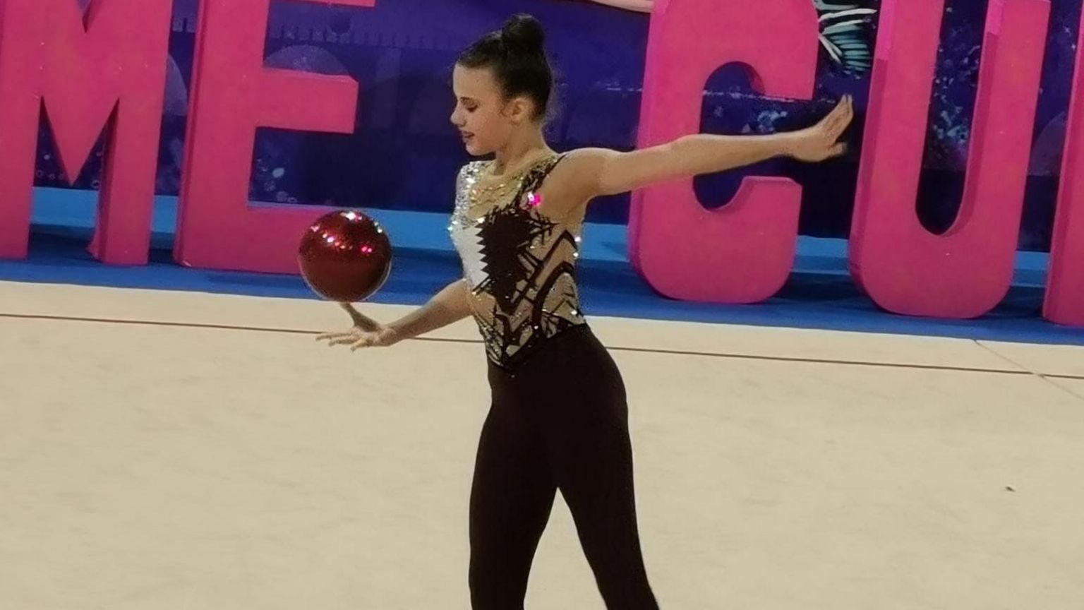 Sasha Gosh doing gymnastics