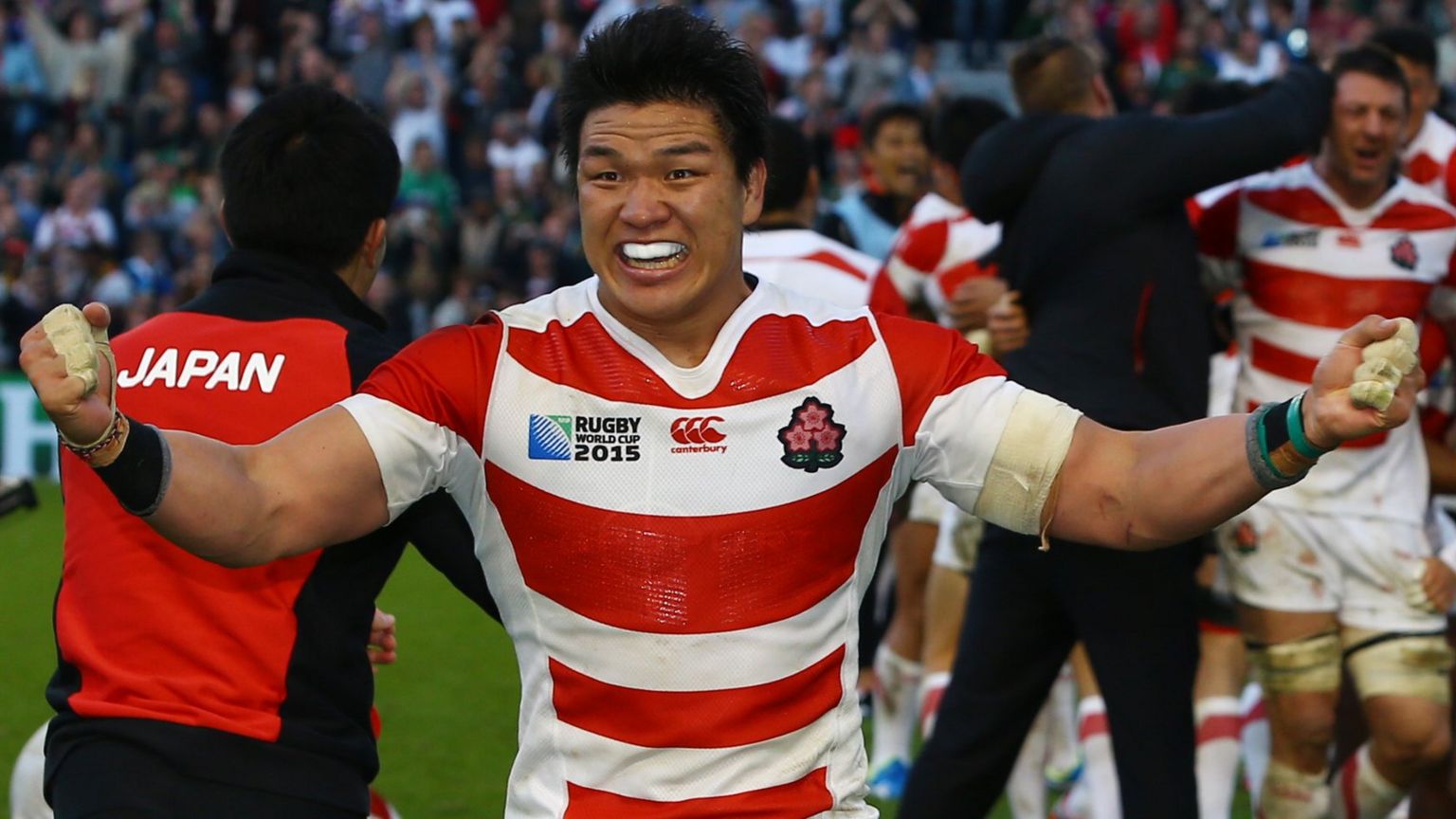 Japan celebrate their Rugby World Cup win over South Africa