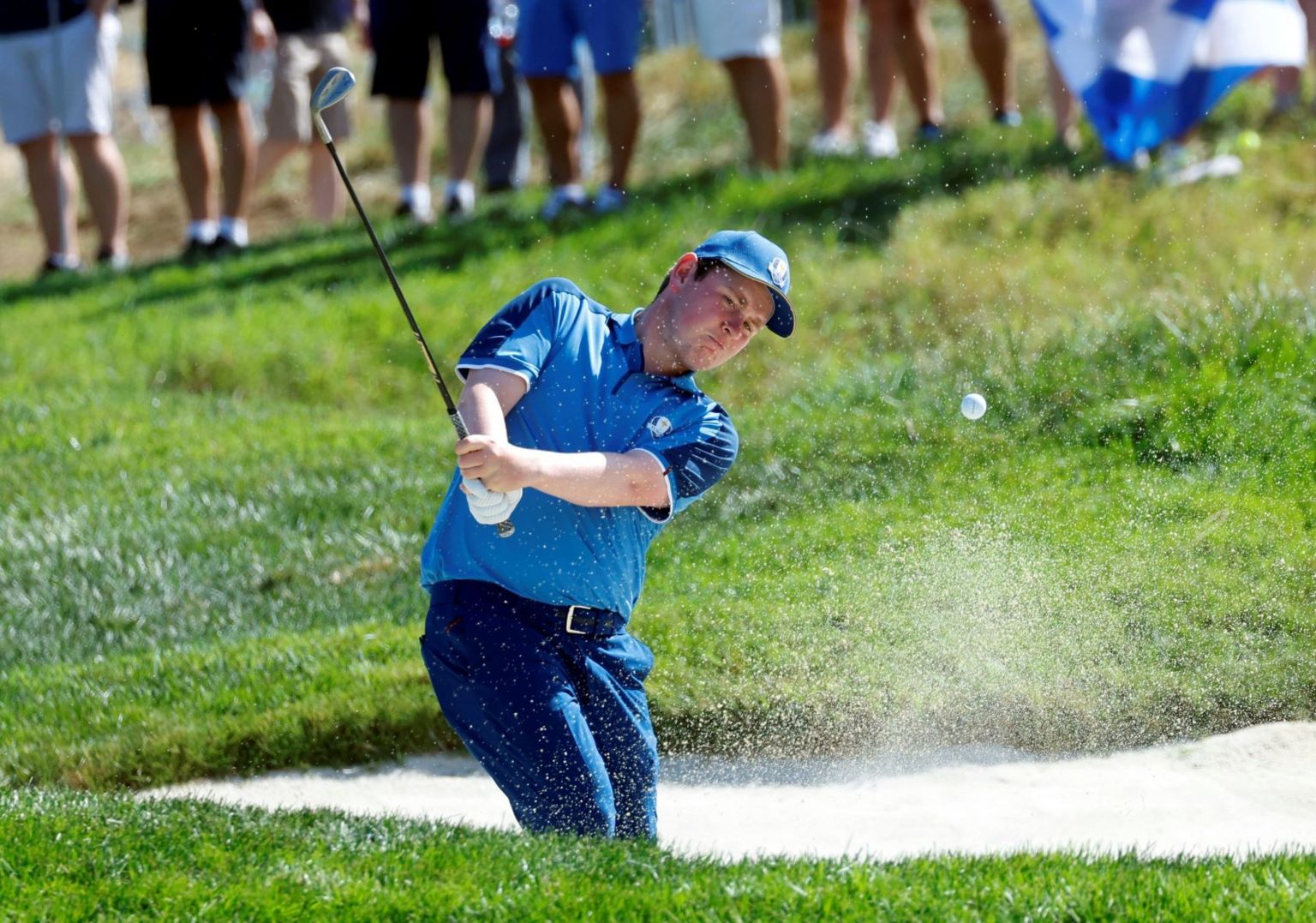 Robert MacIntyre plays out of a bunker during the Ryder Cup