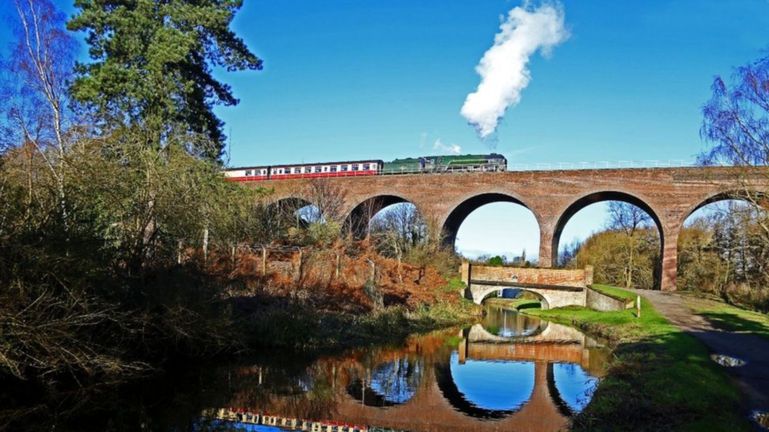 Train crossing viaduct on Severn Valley Railway