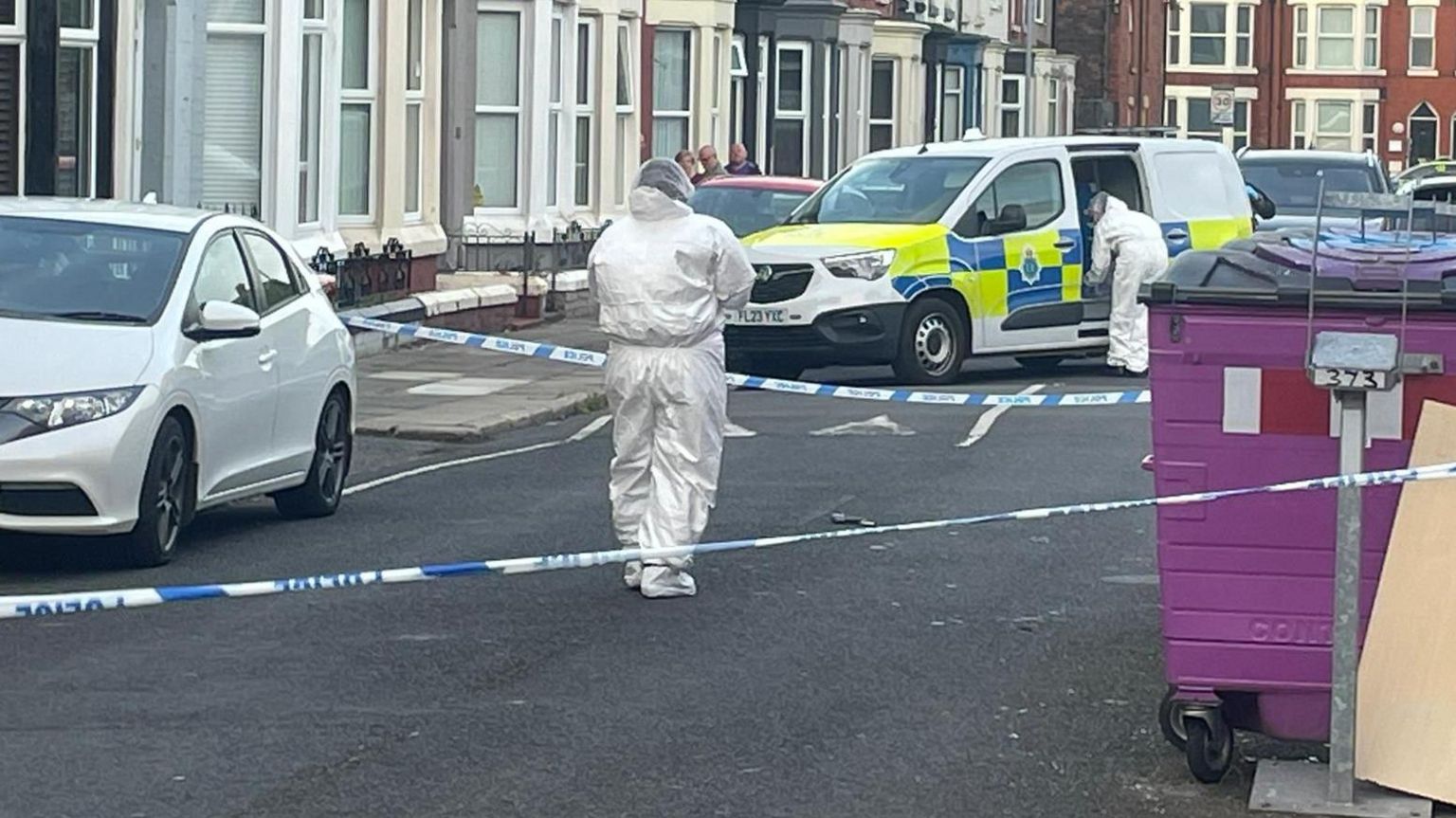 Forensic officers in Bigham Road, Fairfield