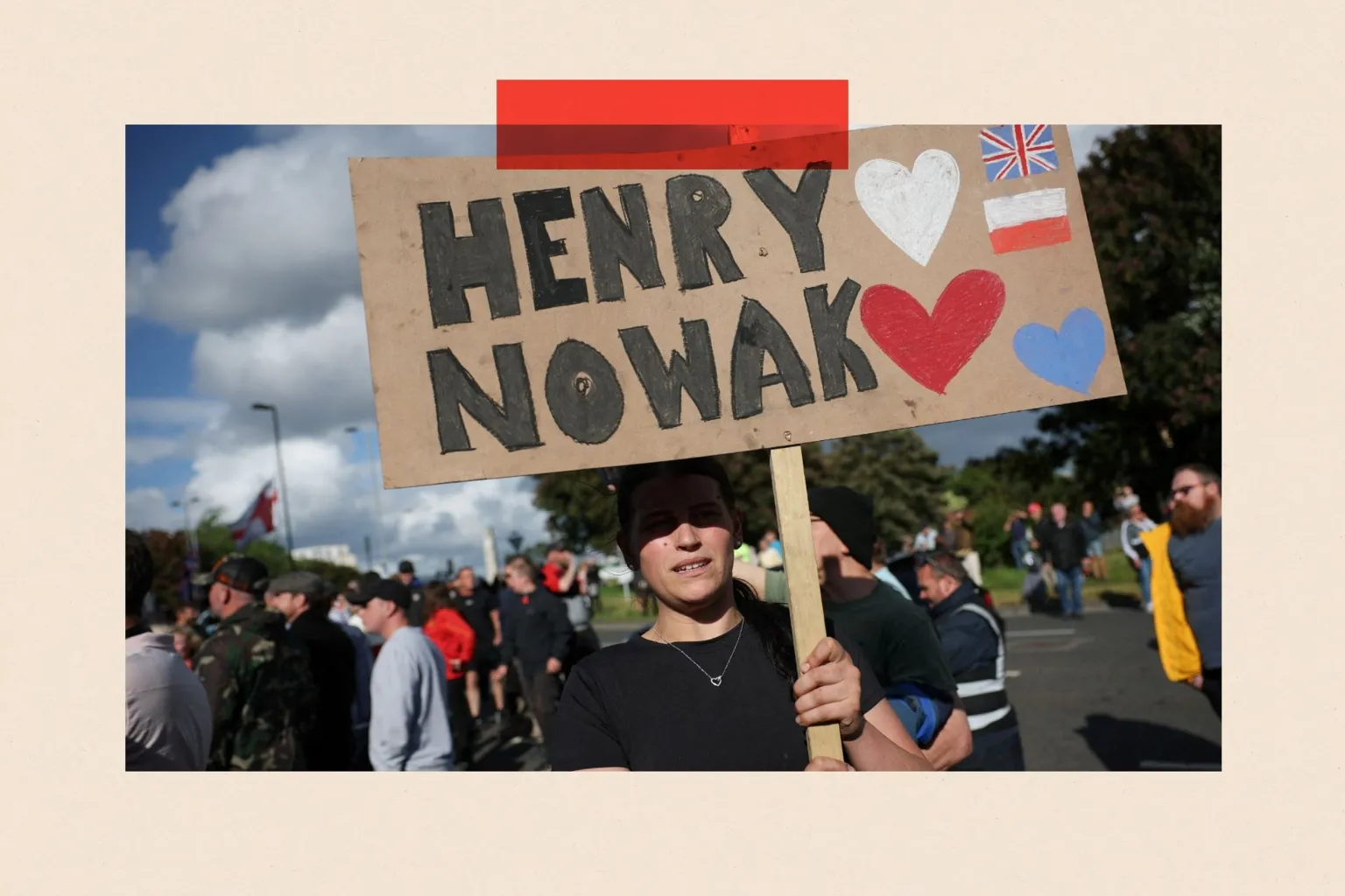 Reuters A demonstrator holds a placard that reads: Henry Nowak