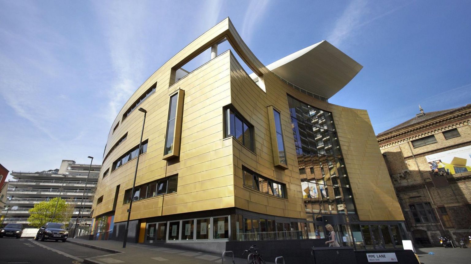 External shot of Bristol Beacon, a large gold building