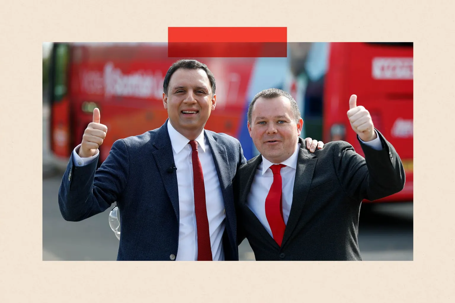 Getty Images Scottish Labour Leader, Anas Sarwar, and Candidate for East Kilbride, Joe Fagan, pose for a photograph with their thumbs up.