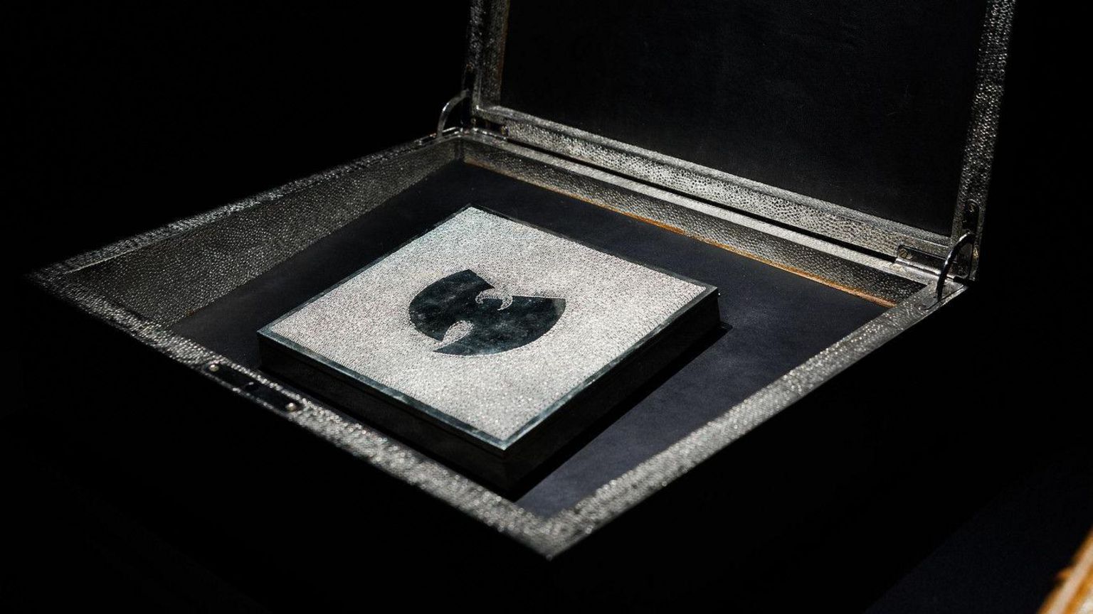 The album housed in a silver box on display in the museum