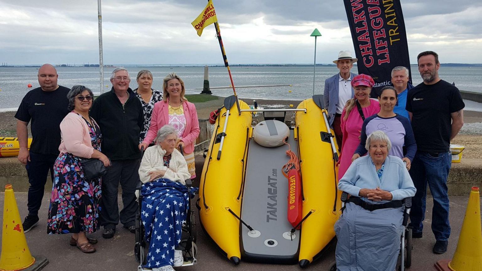 The rescue boat surrounded by supporters