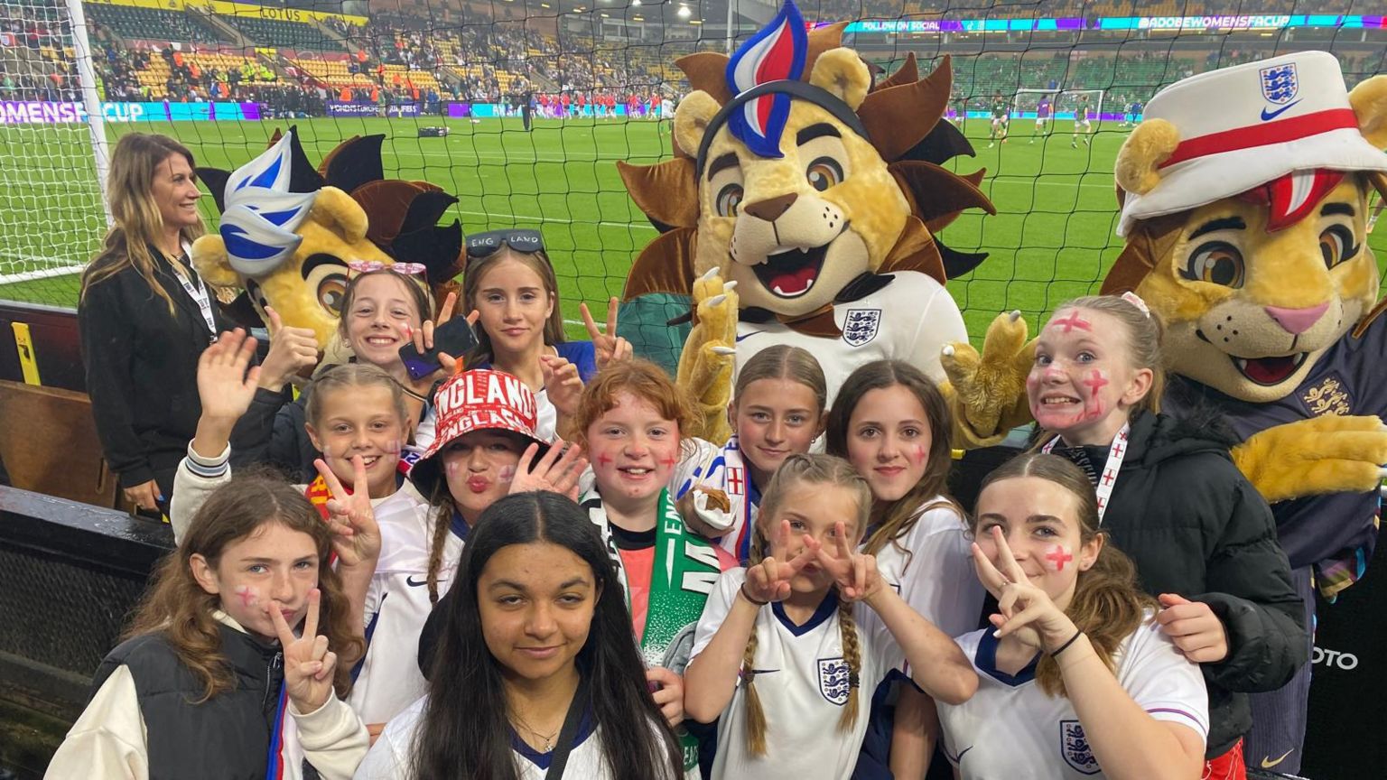 The Witchford Colts under 12s girls team at the England game at Carrow Road