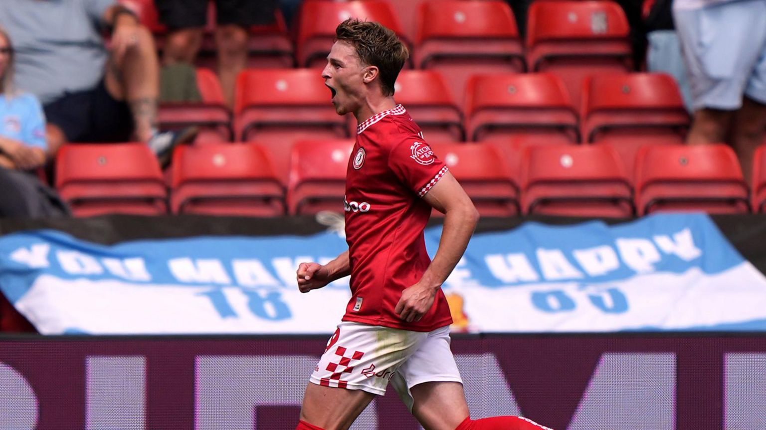 George Tanner celebrates scoring for Bristol City