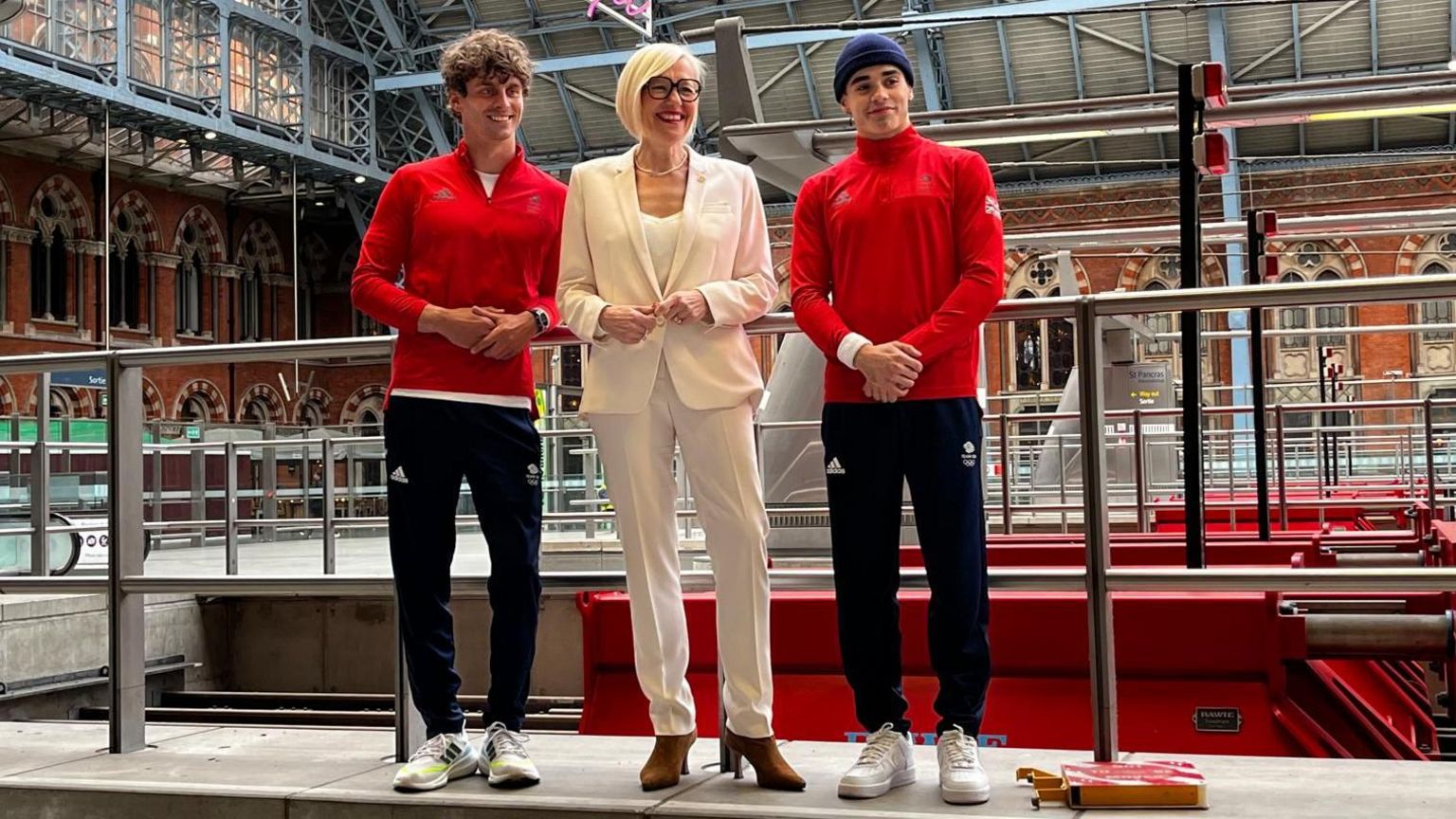 Eurostar's Gwendoline Cazenave with Team GB athletes at London St Pancras station
