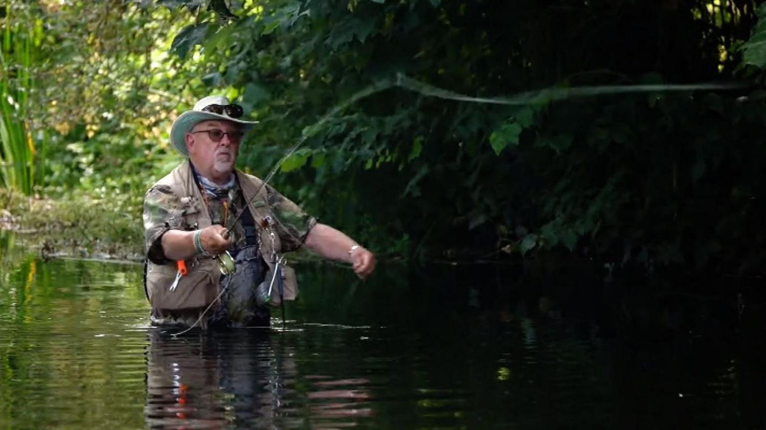 A man fishing for trout on the Kentish Stour 