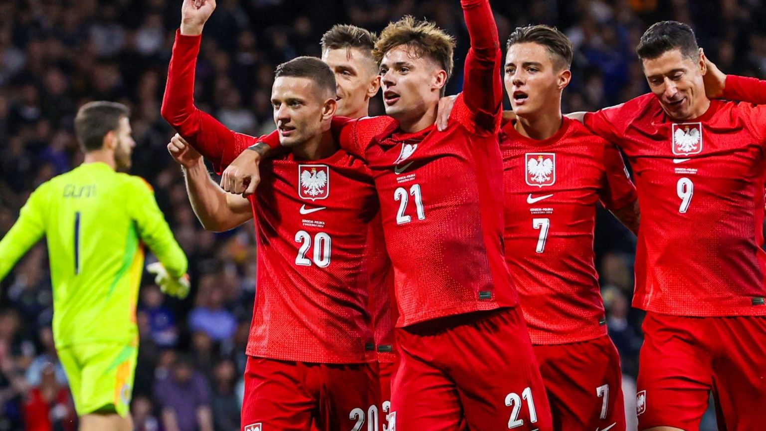 Poland celebrate scoring against Scotland at Hampden