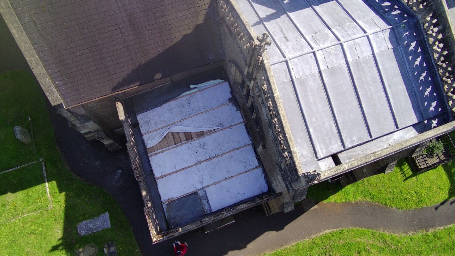 Ariel image of Wincanton Parish Church from above showing the lead missing from the roof 