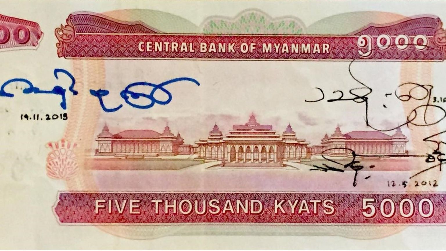 Image of a 5,000 kyat banknote, signed by Aung San Suu Kyi, former dictator Than Shwe and current president Thein Sein