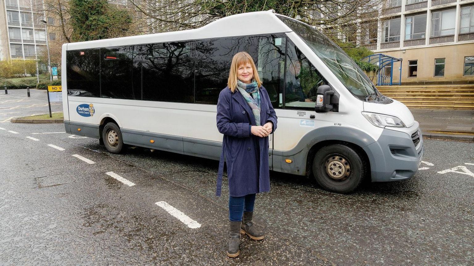 Elizabeth Scott from Durham County Council standing in front of one of the new Link2Work buses