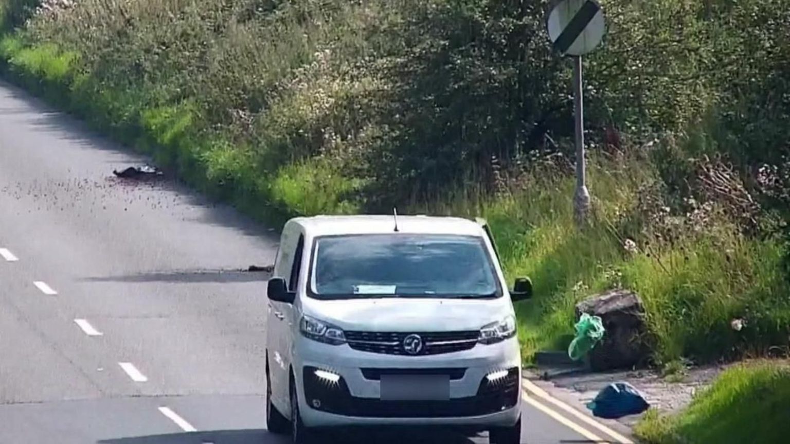 Rubbish being thrown from moving van