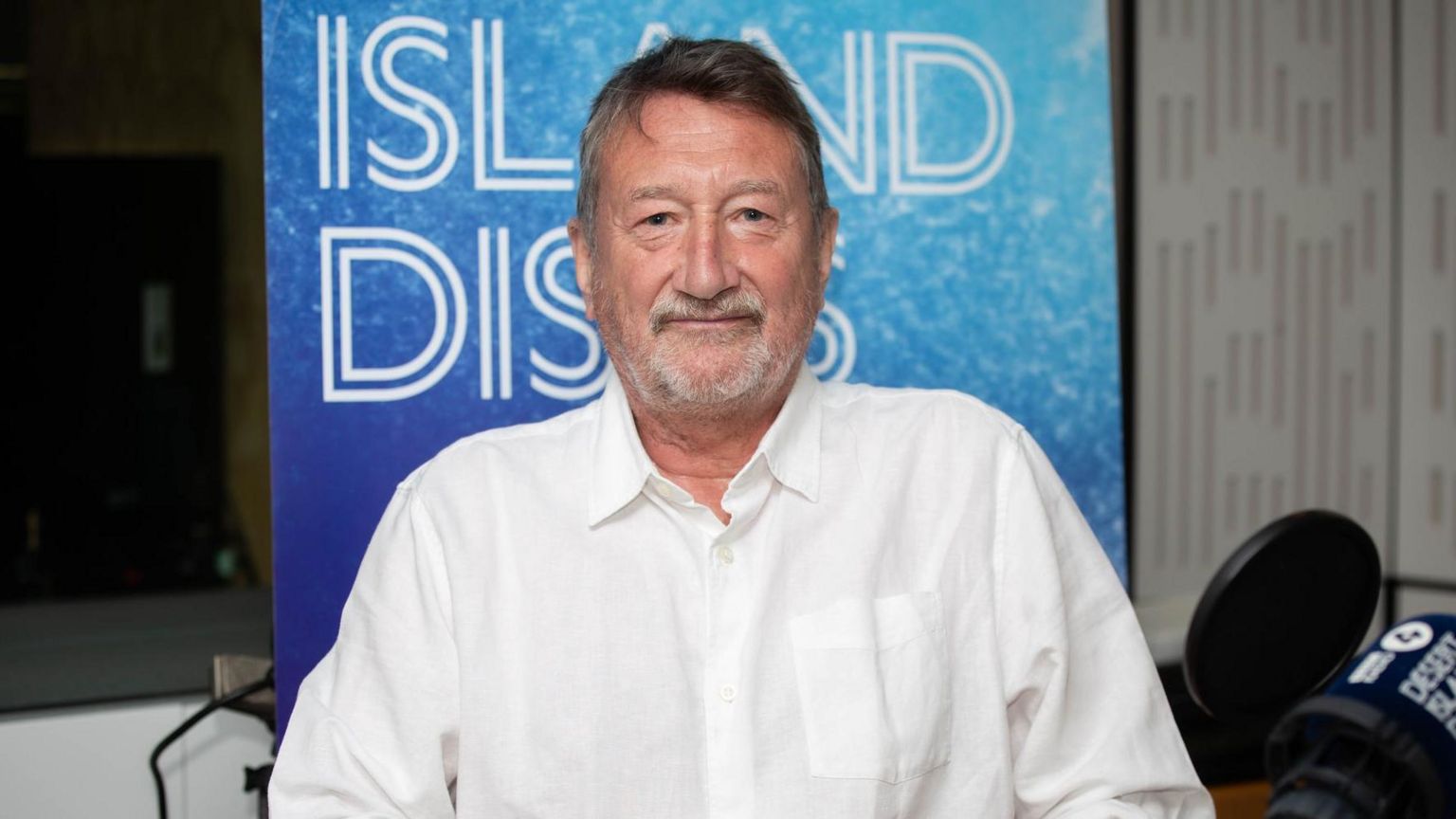 Steven Knight sits in a BBC radio studio