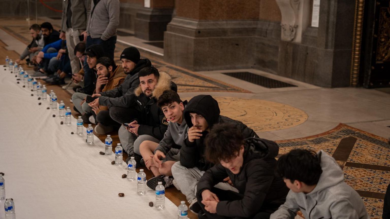 People attending an iftar event at St George's Hall in Liverpool