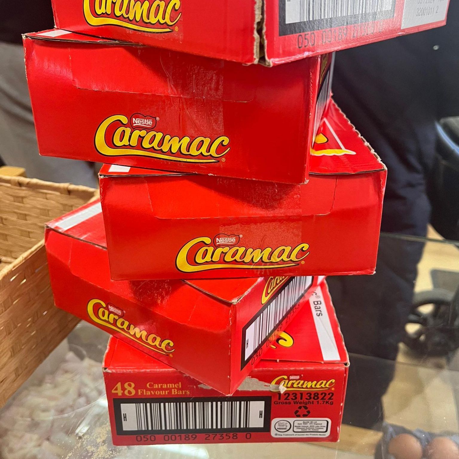 Five stacked red boxes of Caramac bars.