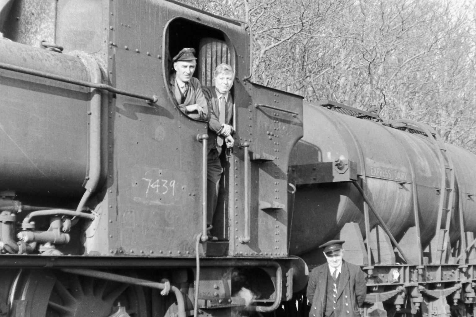 Driver Mr Ben Thomas, Vernon Parry and guard Mr D J Walters at Pont Llanio station and milk depot 