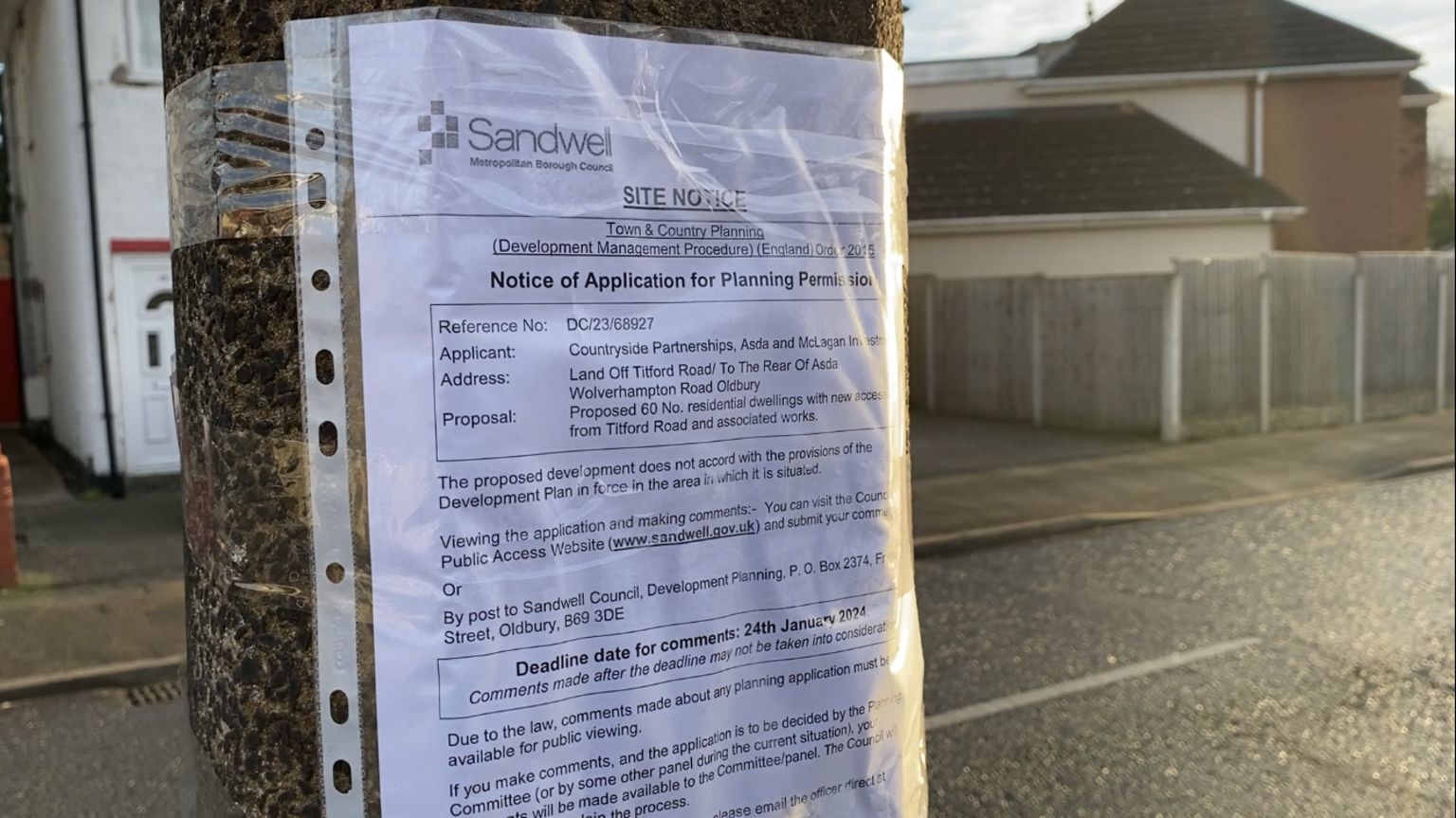 A planning notice on a pole on Titford Road 