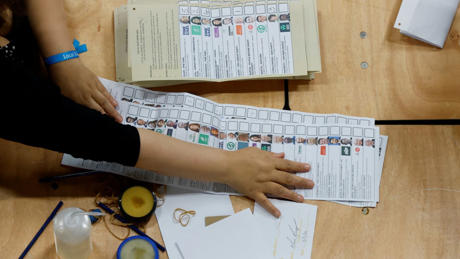 European and local ballot papers are separated before starting the count at a local election counting centre in Dublin