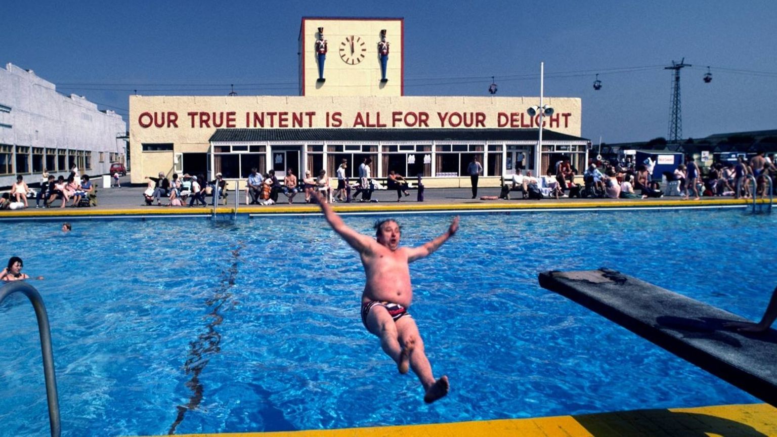 A man falls in the swimming pool