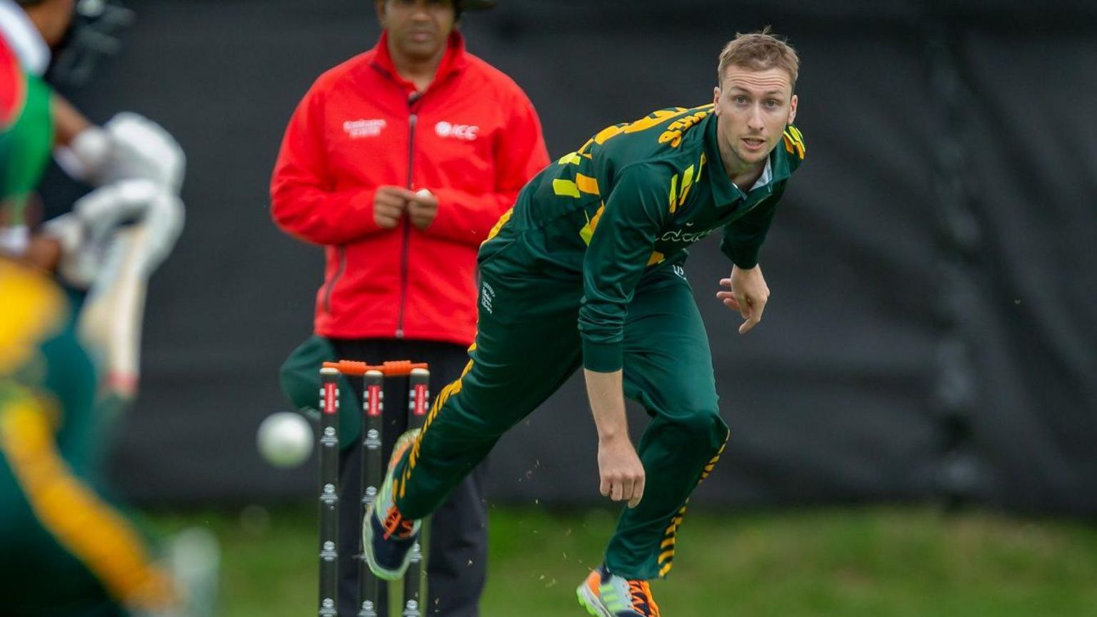 Matt Stokes bowling for Guernsey