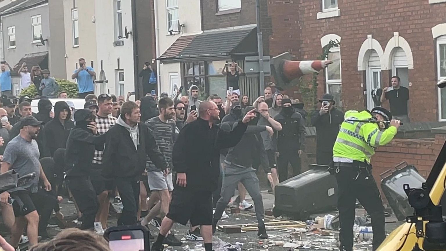 Trouble flares during a protest in Southport, after three children died and eight were injured in a "ferocious" knife attack during a Taylor Swift event at a dance school on Monday.