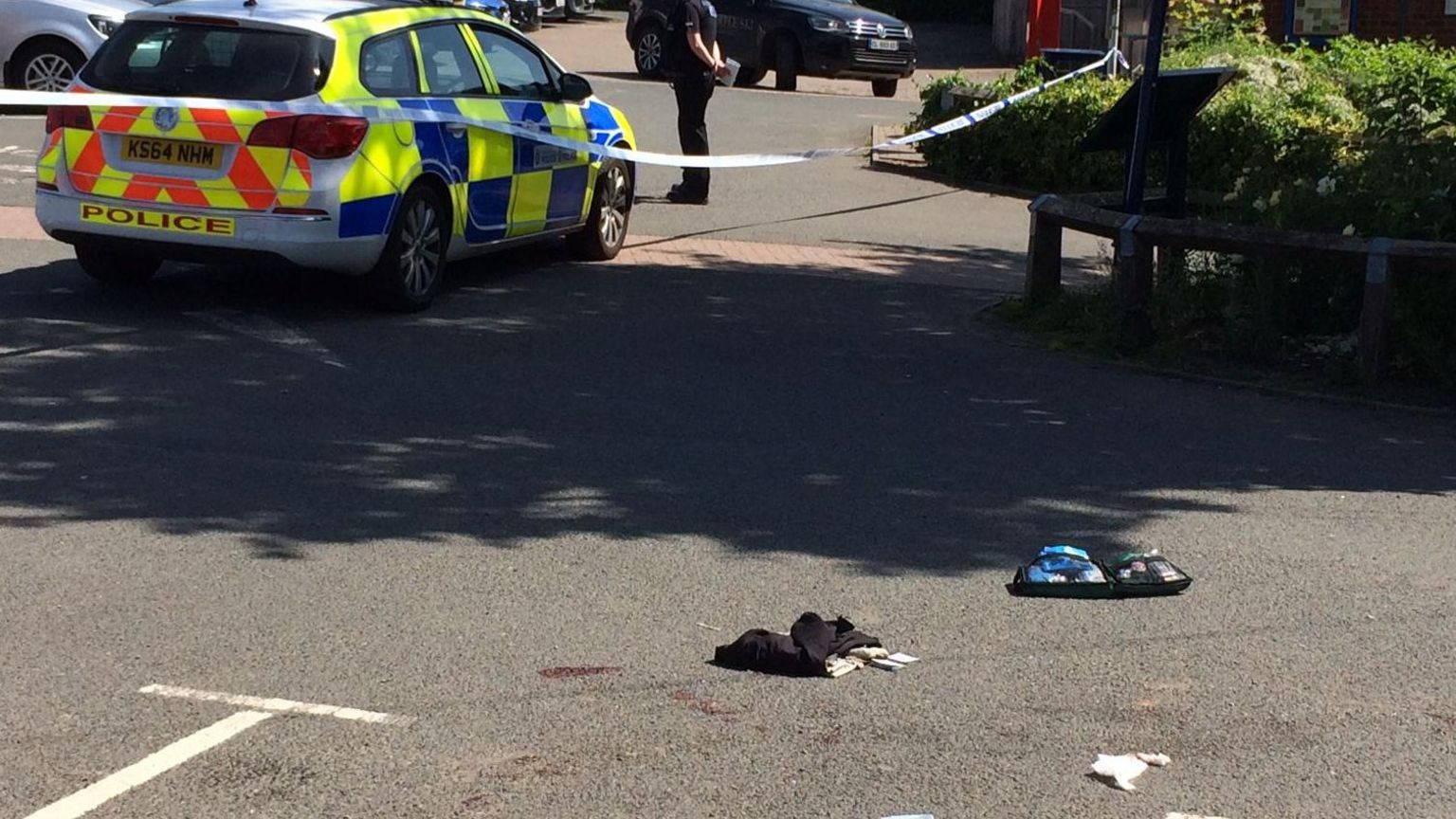 Police guard the scene of the attack in Bromyard